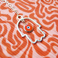 Gold Hamsa Statement Necklace with Glass Orange Evil Eye