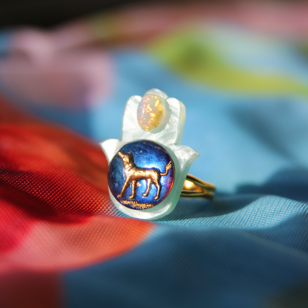 Howling at an Opal Moon Blue Swirl Dog Hamsa Ring