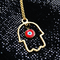 Gold Hamsa Statement Necklace with Red and Gold Evil Eye